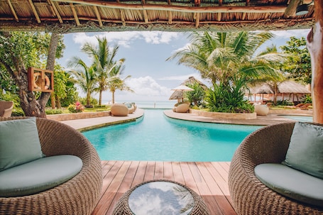 2 outdoor pools, pool umbrellas, sun loungers. Tulia Zanzibar Unique Beach Resort