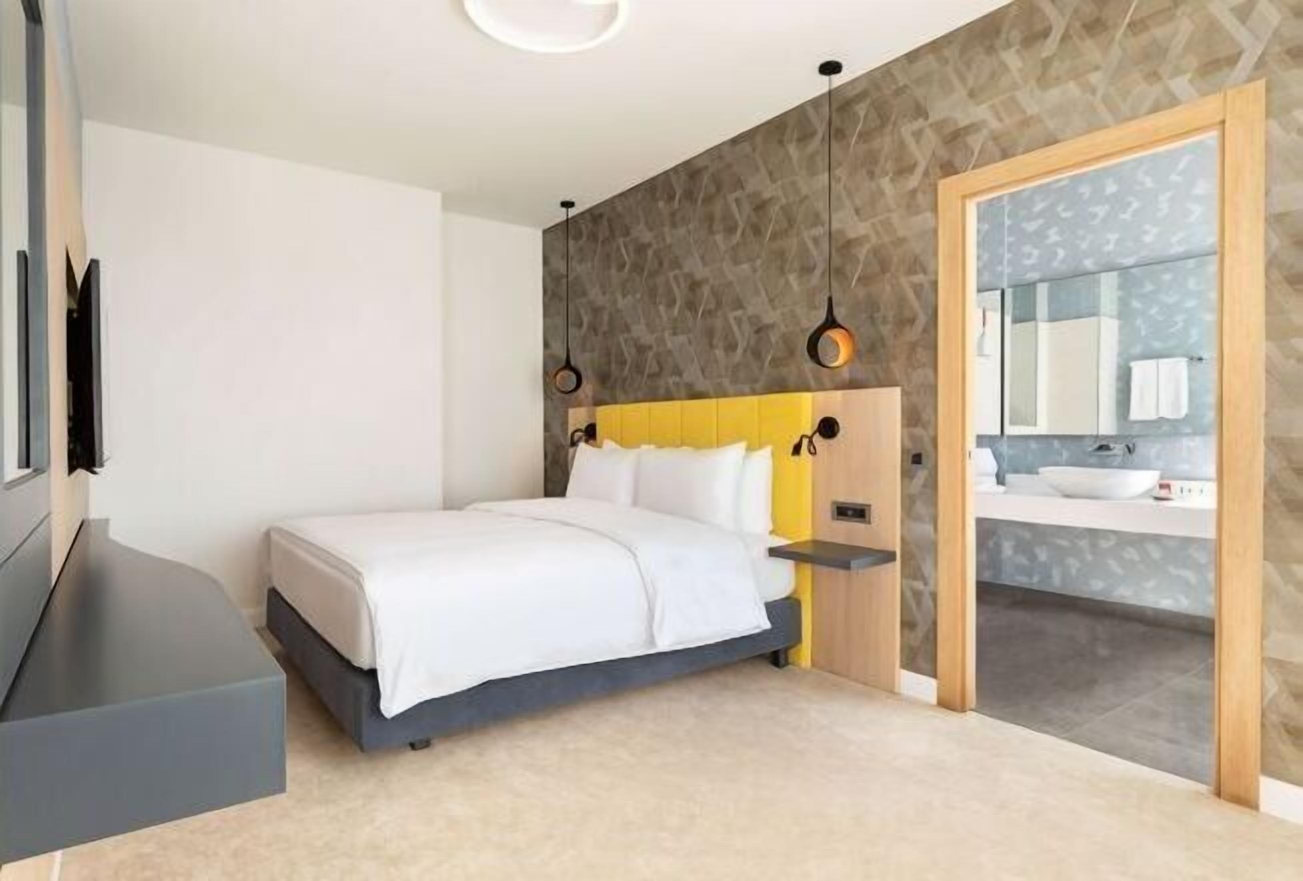Ropa de cama de alta calidad, minibar, escritorio y insonorización 