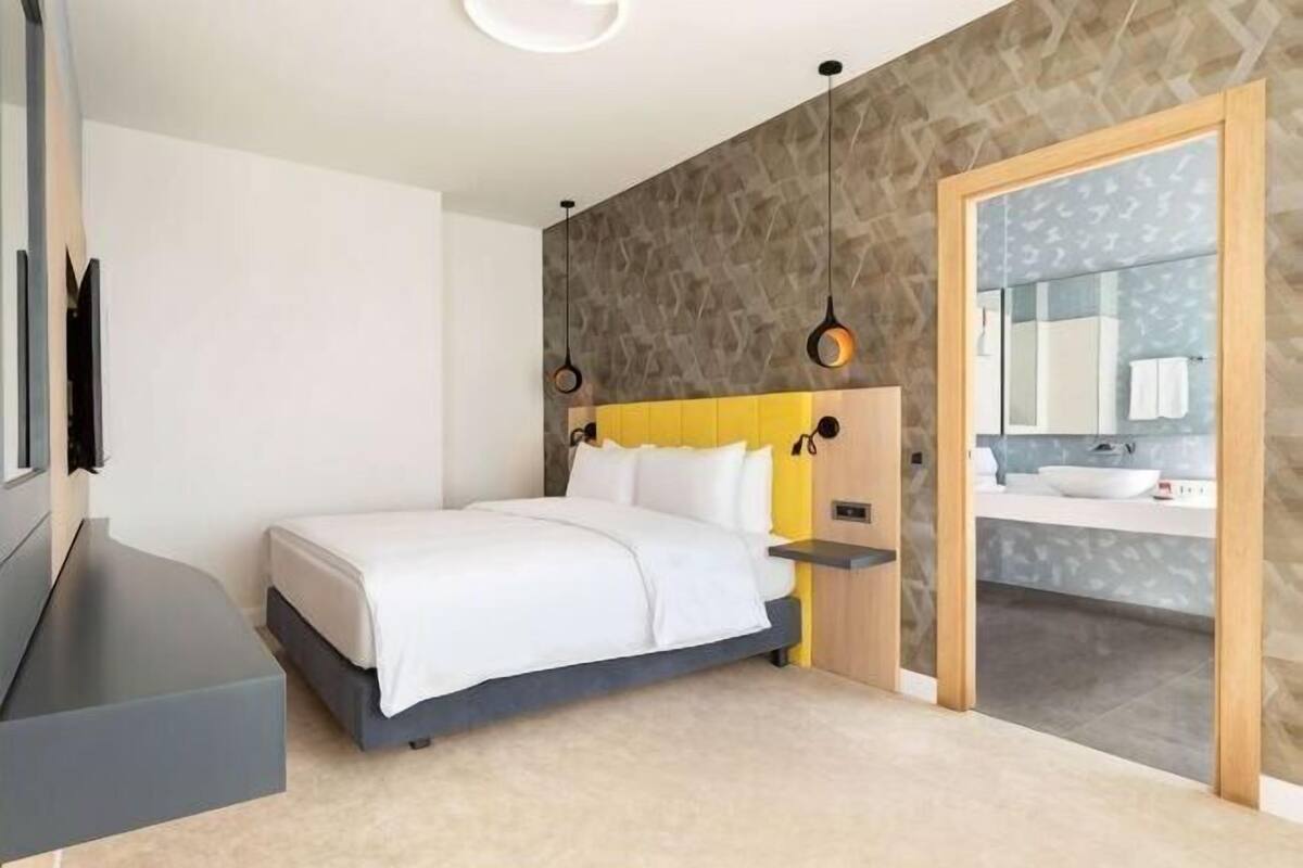 Ropa de cama de alta calidad, minibar, escritorio y insonorización