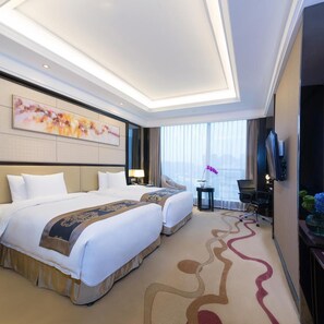 A hotel room with two beds, a large window, a flat-screen TV, and a decorative wall piece. - Dading Century Plaza Hotel (Chengdu)