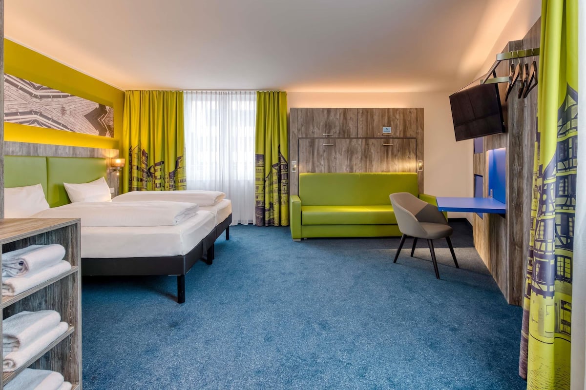 Standard Suite | 1 bedroom, in-room safe, desk, blackout drapes