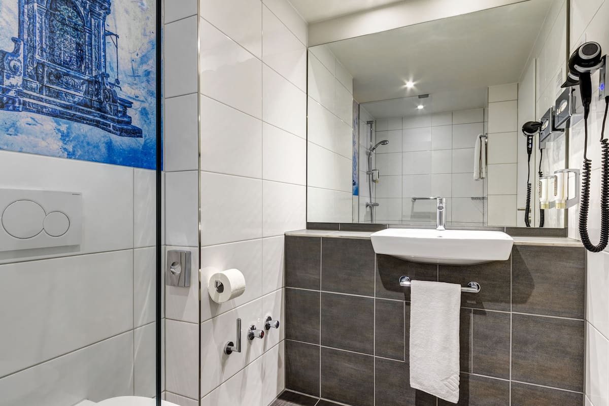 shower, eco-friendly toiletries, hair dryer, towels