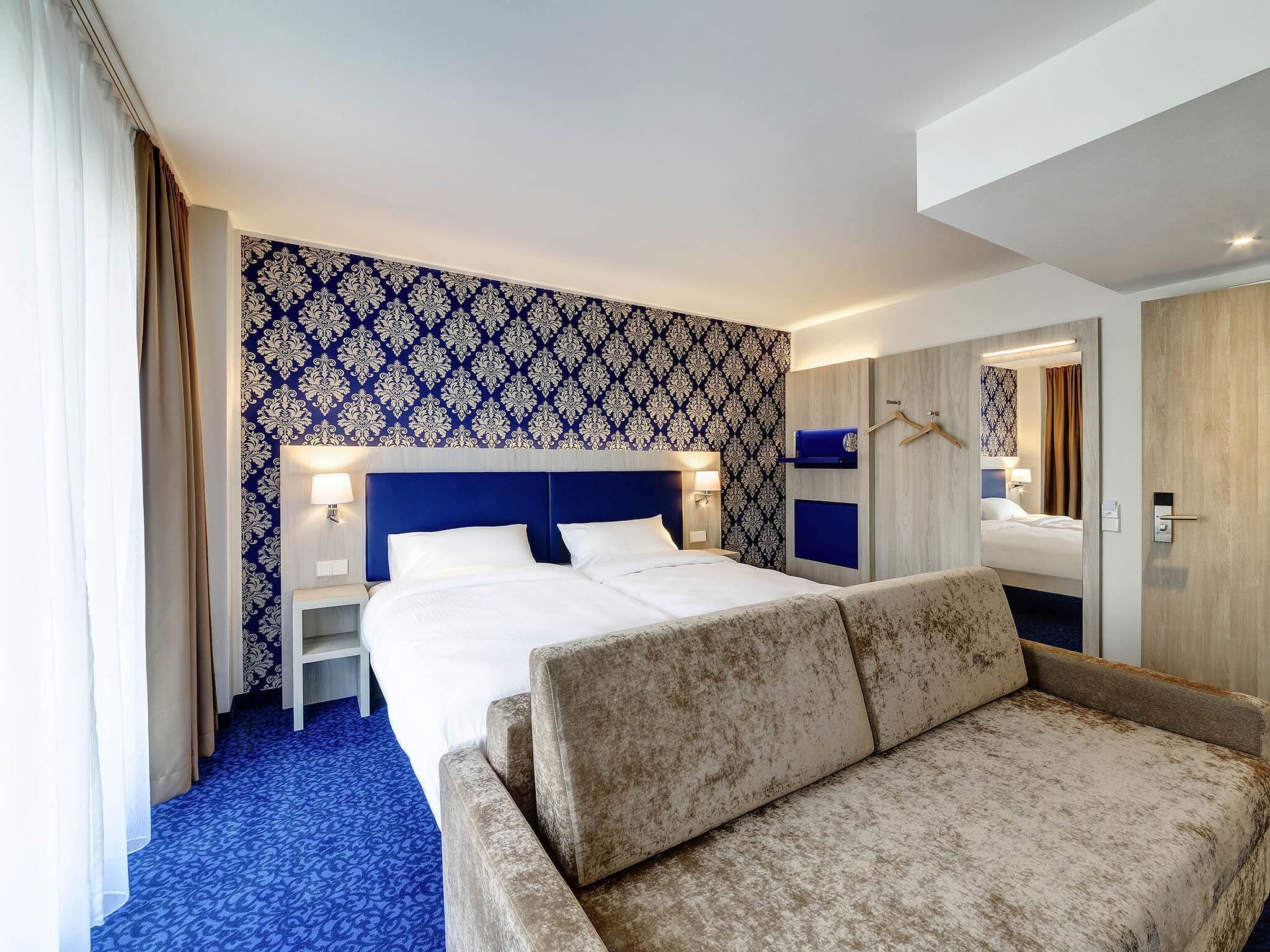 family room, 1 double bed with sofa bed (all comfort) | in-room safe, desk, soundproofing, iron/ironing board