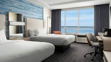 Premium bedding, down comforters, desk, laptop workspace