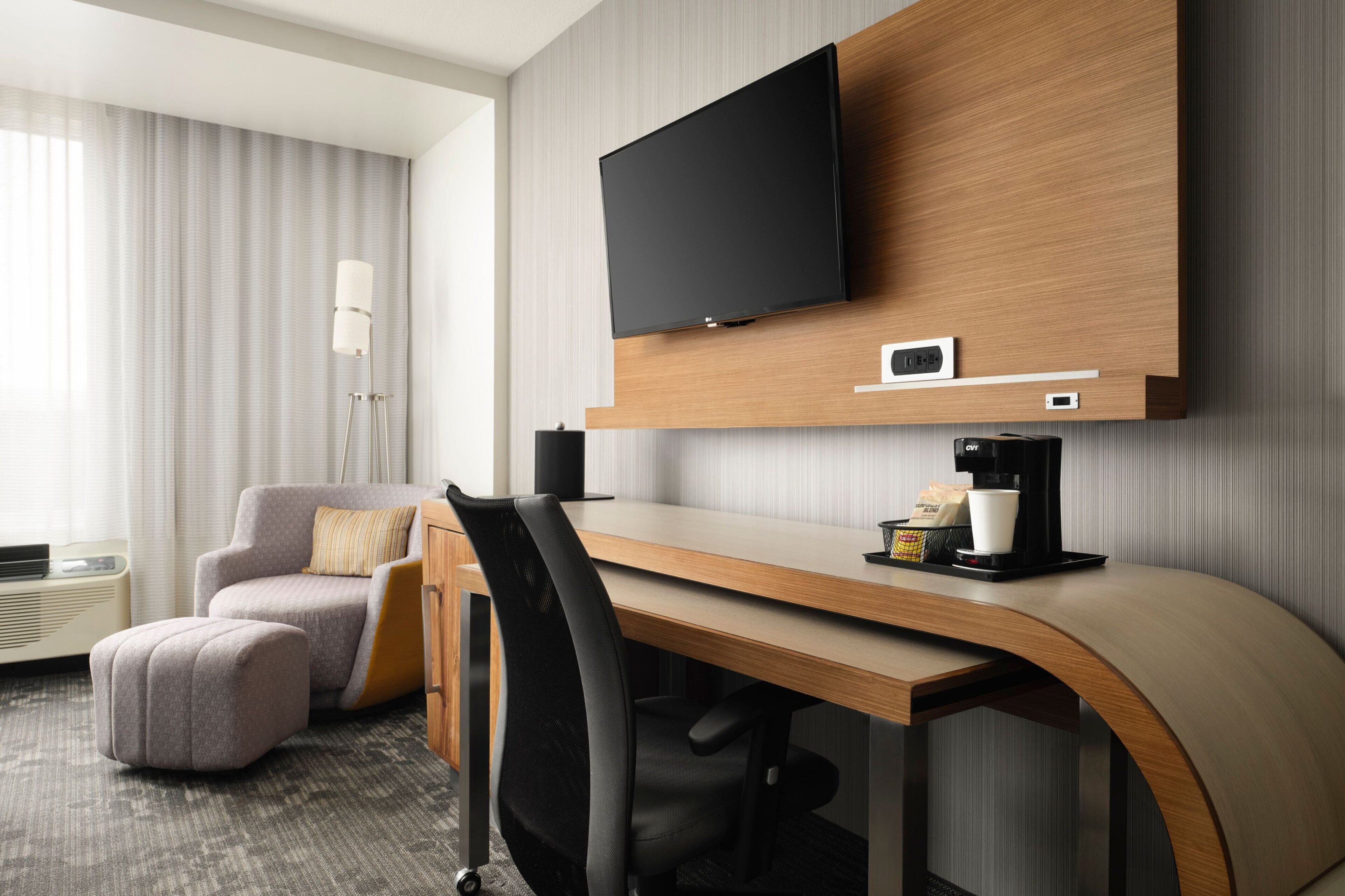 premium bedding, down duvets, desk, laptop workspace