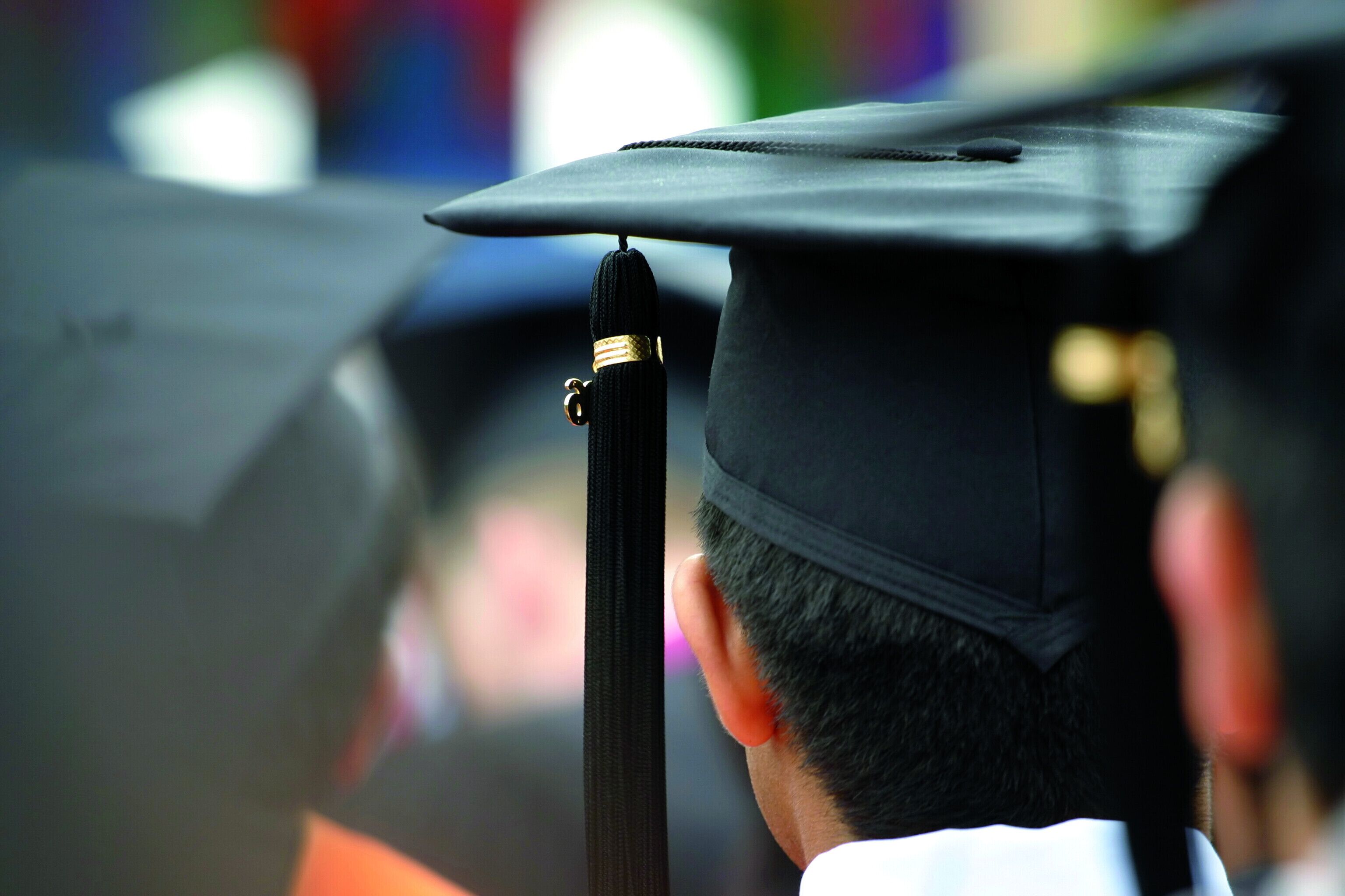 A graduation cap with a tassel, indicating a graduation ceremony.