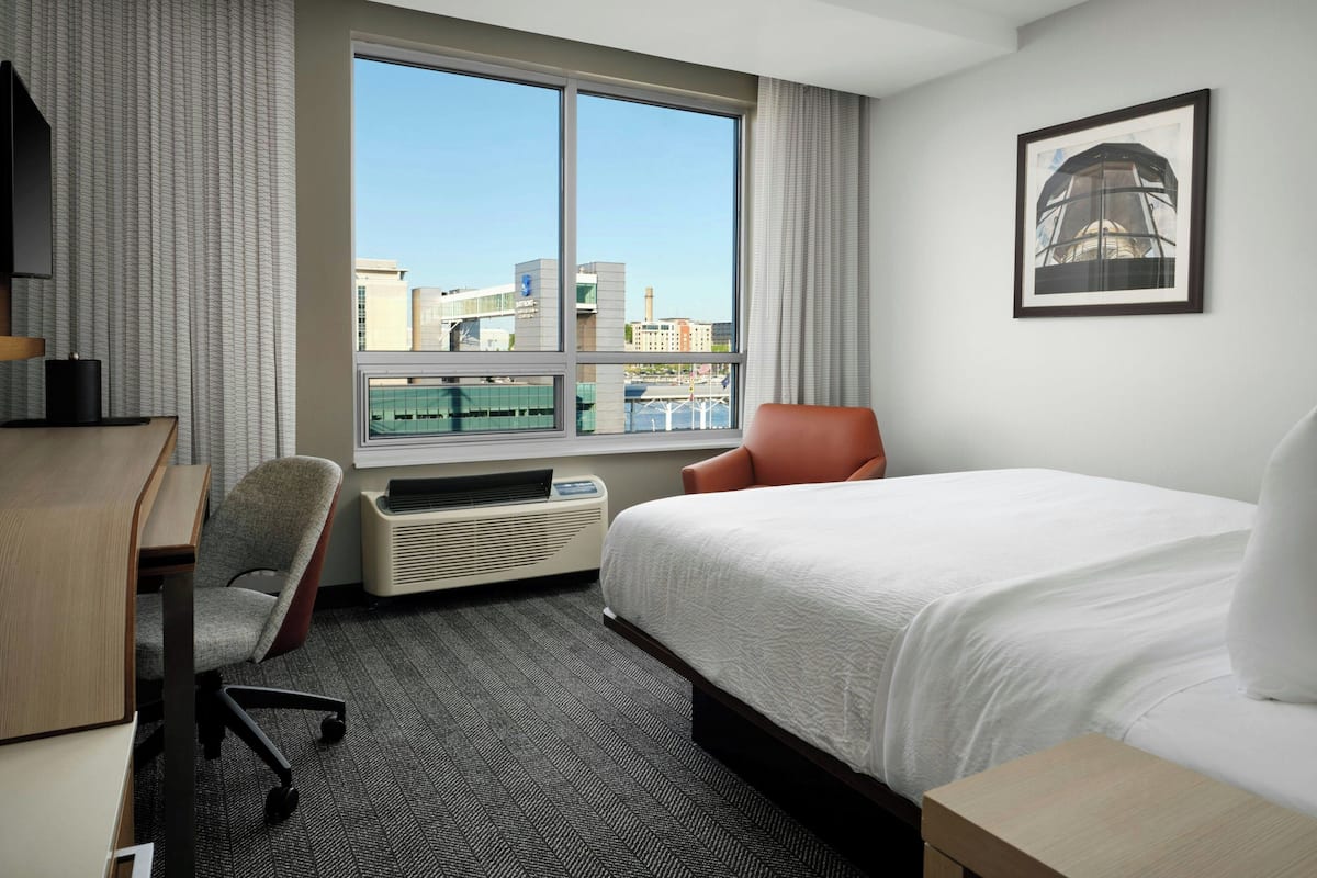 Premium bedding, down comforters, desk, laptop workspace