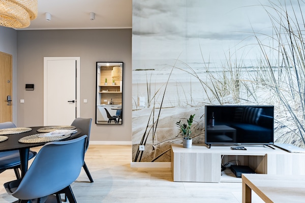 Departamento, 1 habitación | Área de sala de estar | Televisión de pantalla plana de 40 pulgadas con canales por cable