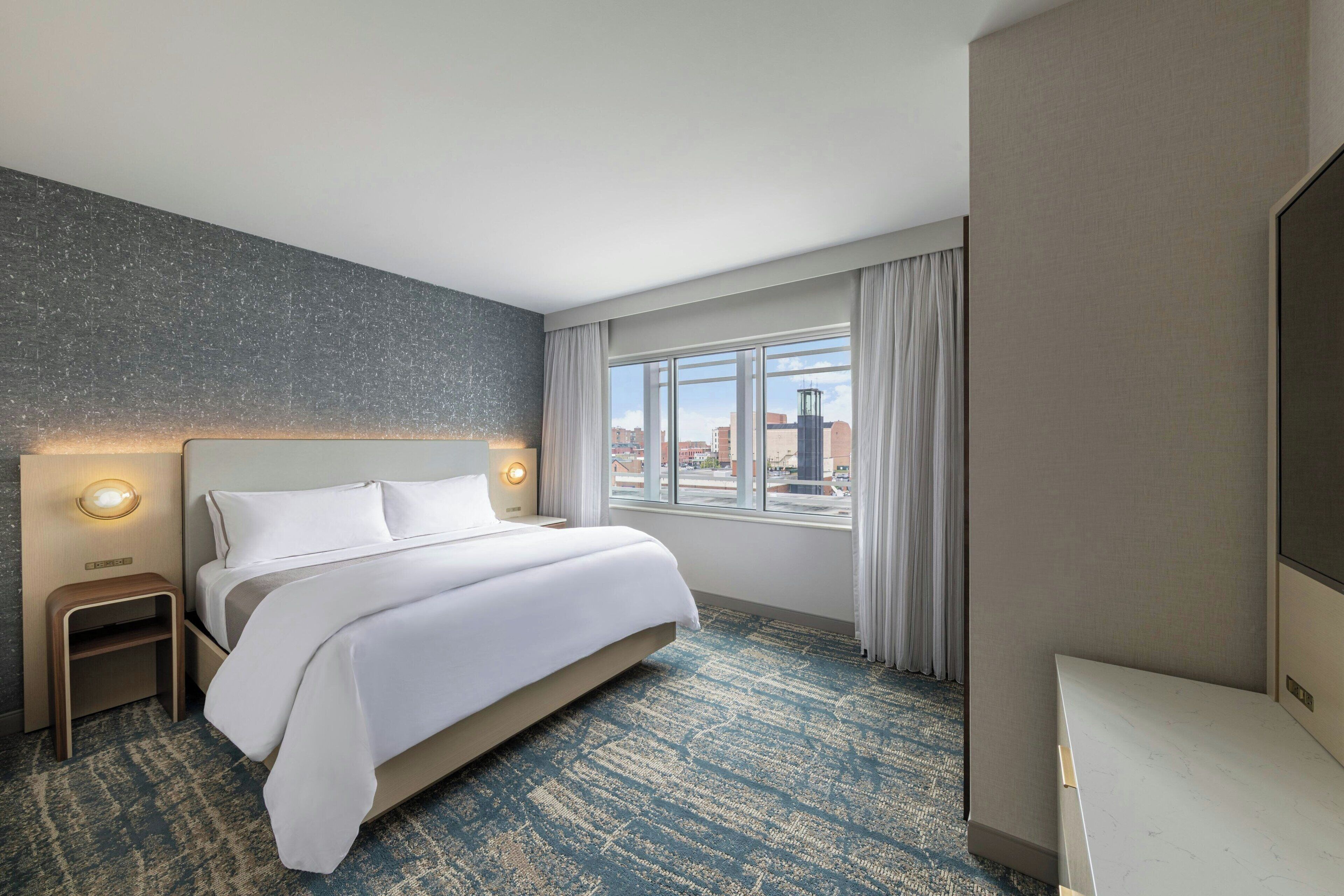 in-room safe, desk, blackout curtains, iron/ironing board