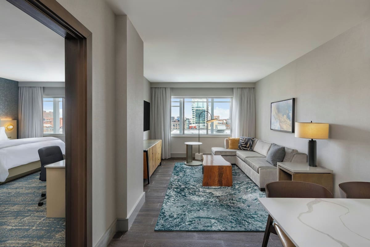 Executive Suite, 1 King Bed with Sofa bed, Non Smoking | Living area | 49-inch flat-screen TV with cable channels, TV, pay movies