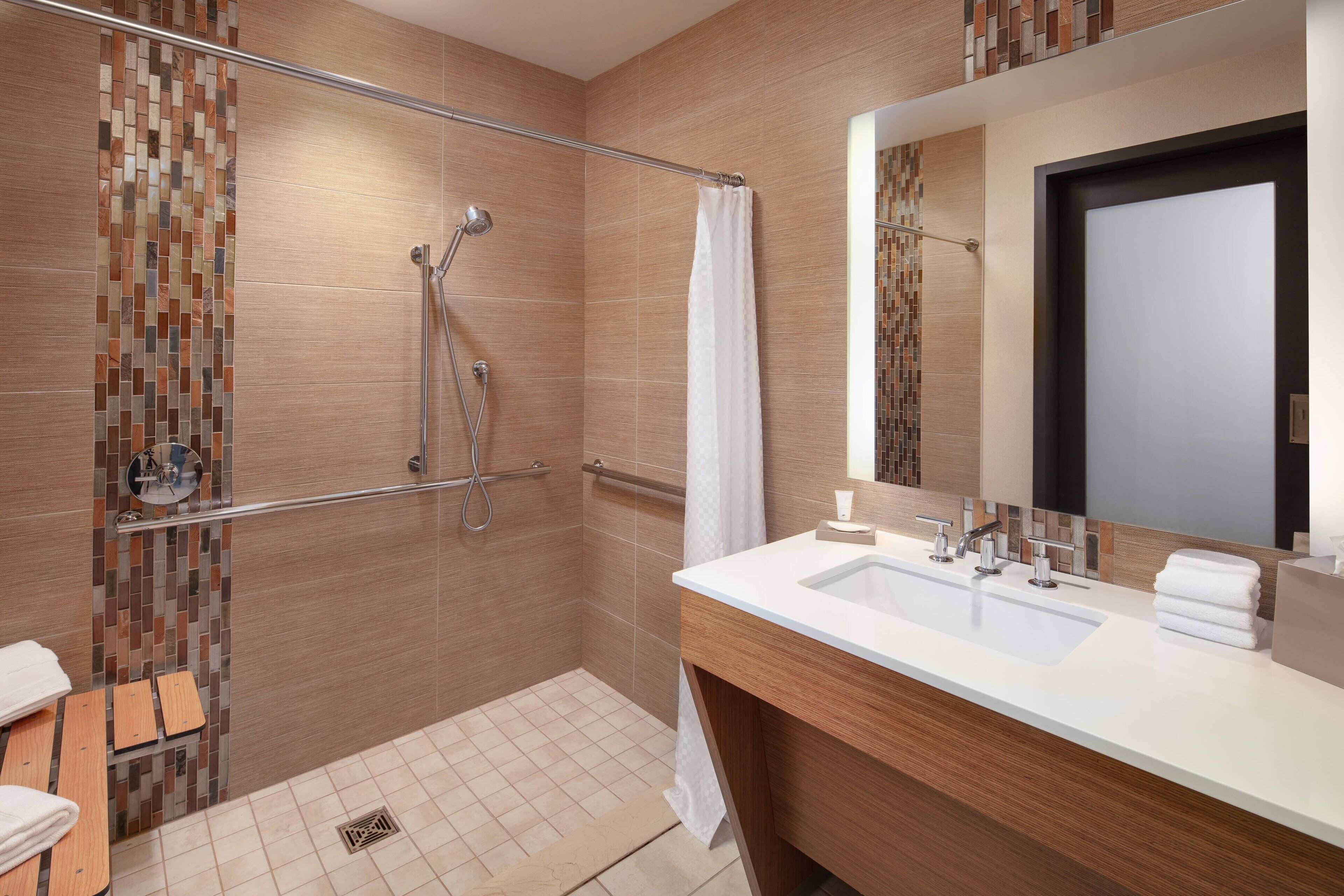 combined shower/bathtub, free toiletries, hair dryer, bathrobes