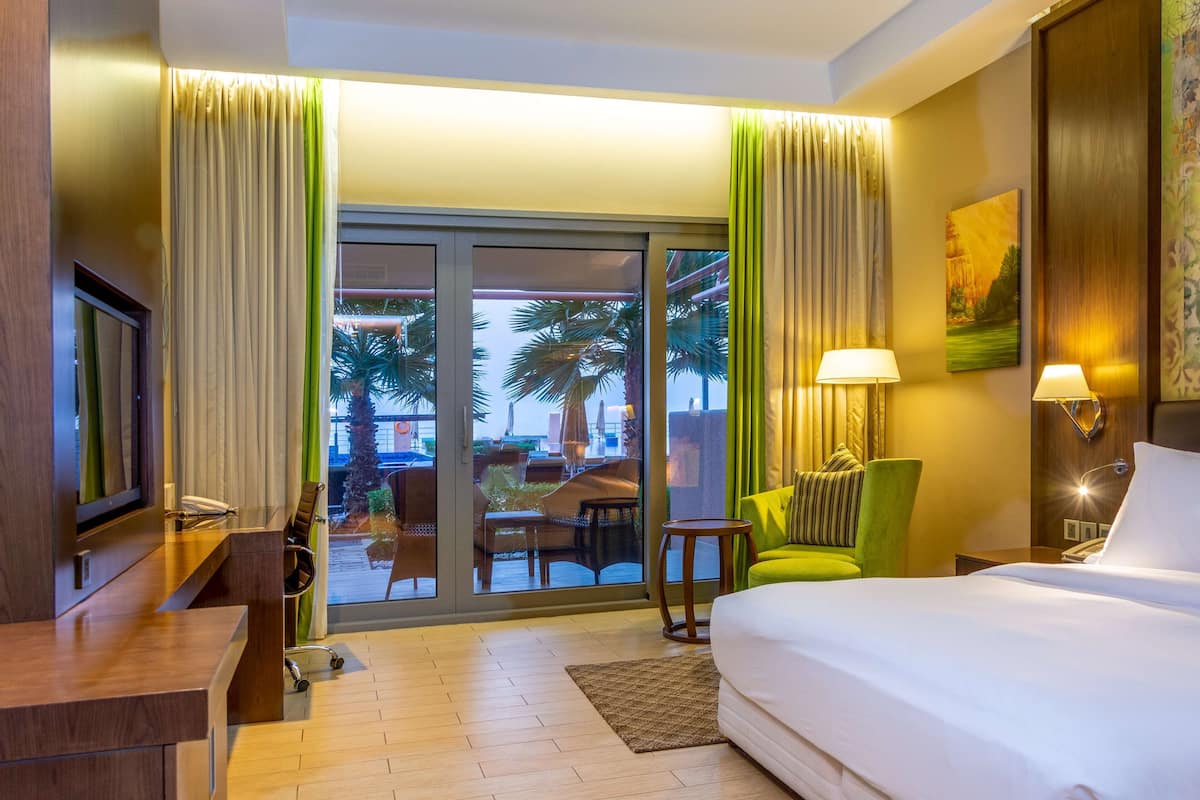 premium room, terrace, ocean view | 1 bedroom, premium bedding, minibar, in-room safe