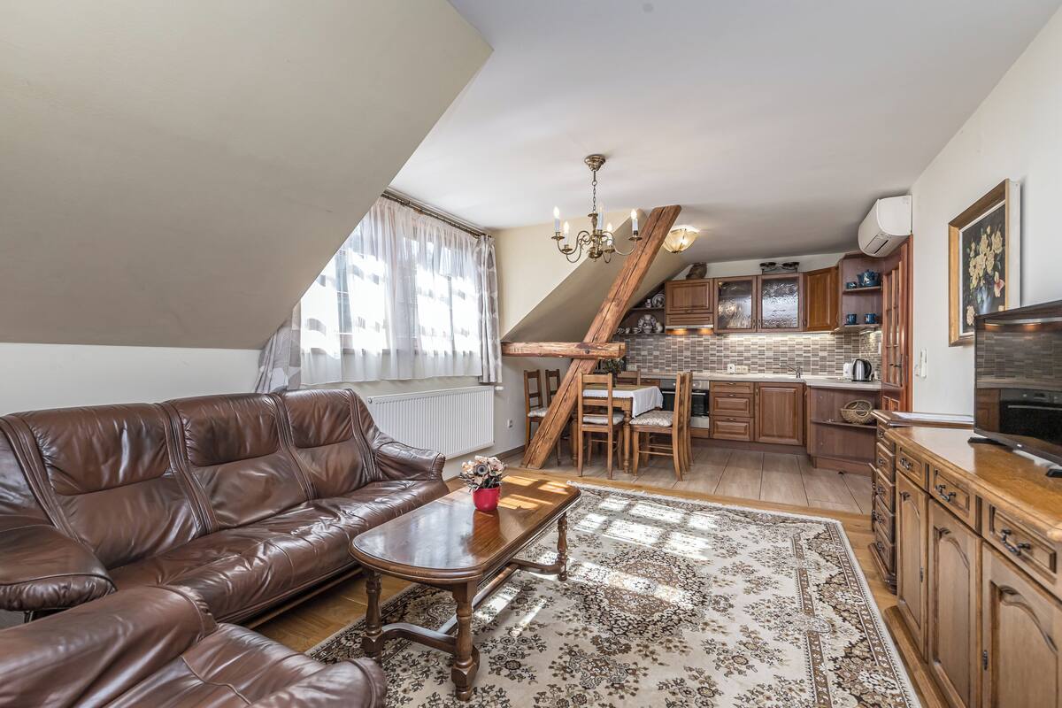 Comfort Apartment, 3 Bedrooms, Balcony, Garden View | Living area | Flat-screen TV, toys
