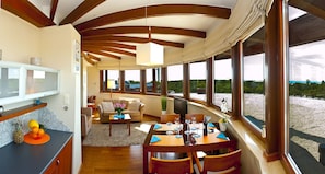 Departamento, vista al mar | Área de sala de estar | Televisión de pantalla plana