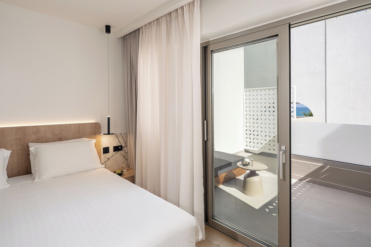 Premium bedding, memory-foam beds, in-room safe, desk