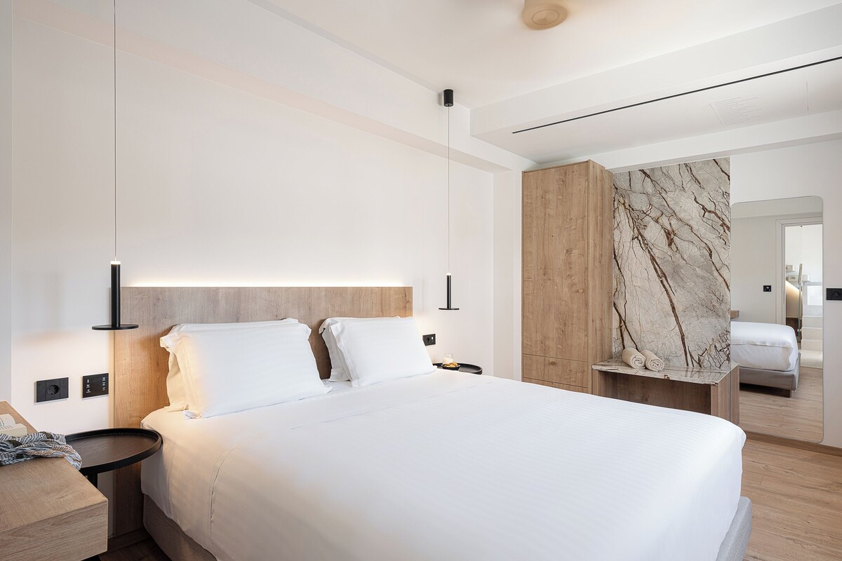 Premium bedding, memory-foam beds, in-room safe, desk