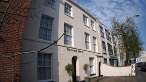 A building with the sign "The Coach House" on the facade. - The Coach House Canterbury (Canterbury)