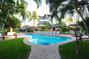 Outdoor pool, pool umbrellas, pool loungers