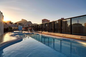 Outdoor pool, open 9:00 AM to 5:00 PM, pool umbrellas, sun loungers