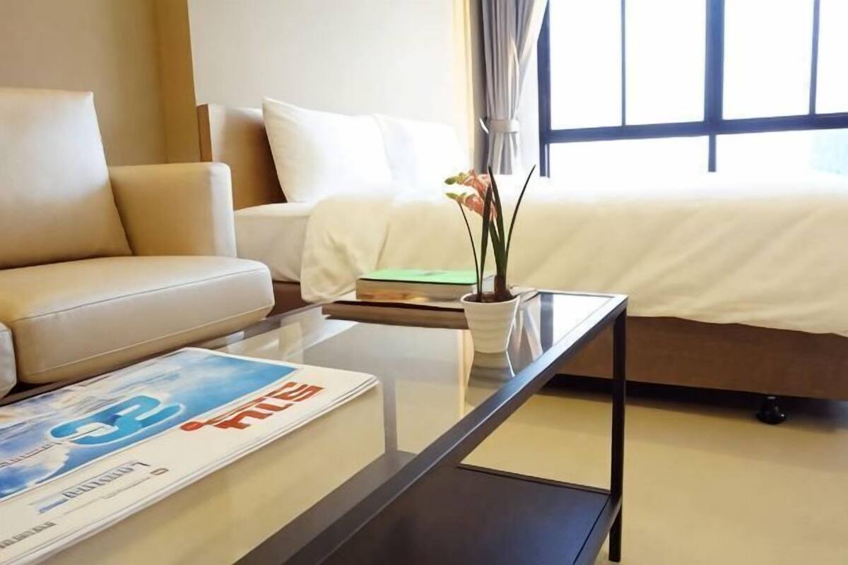 Desk, laptop workspace, free WiFi, bed sheets