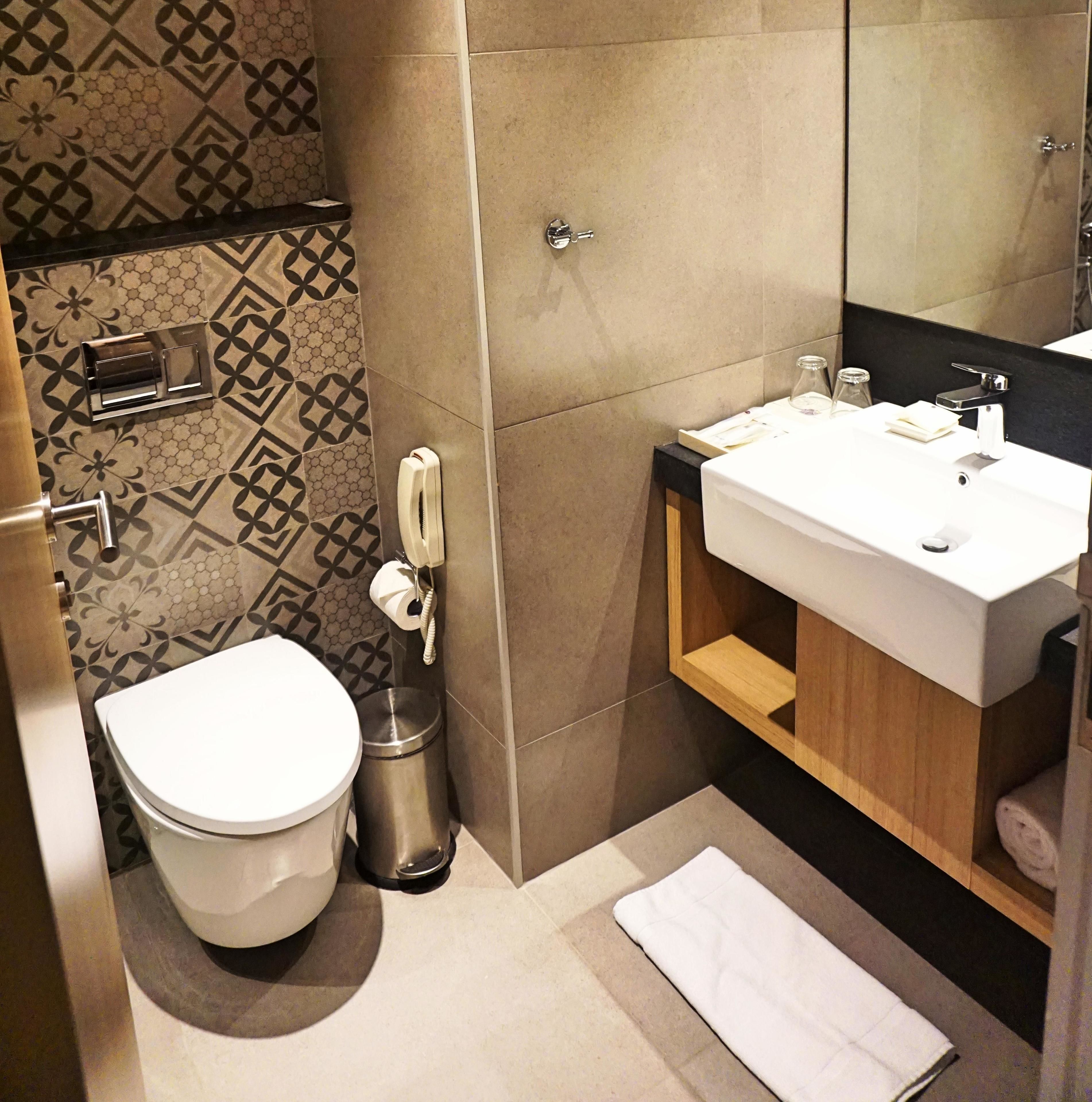 shower, eco-friendly toiletries, hair dryer, slippers