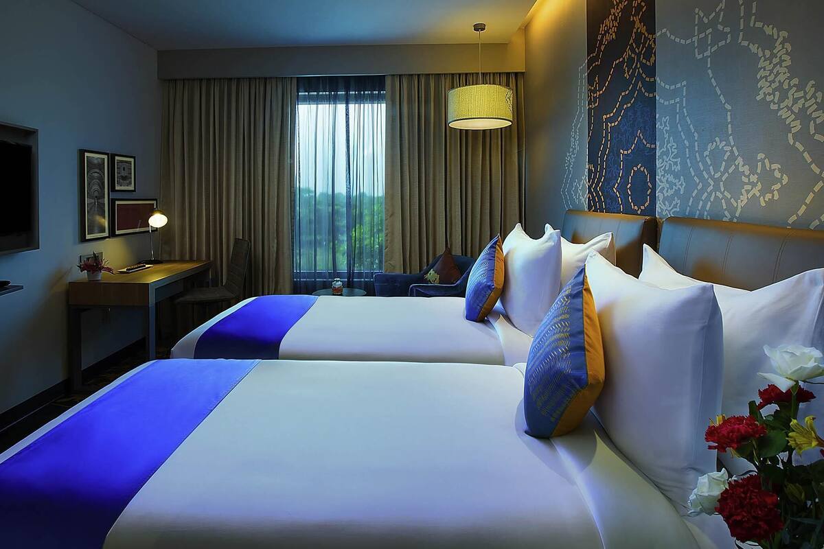 Premium bedding, memory foam beds, in-room safe, desk