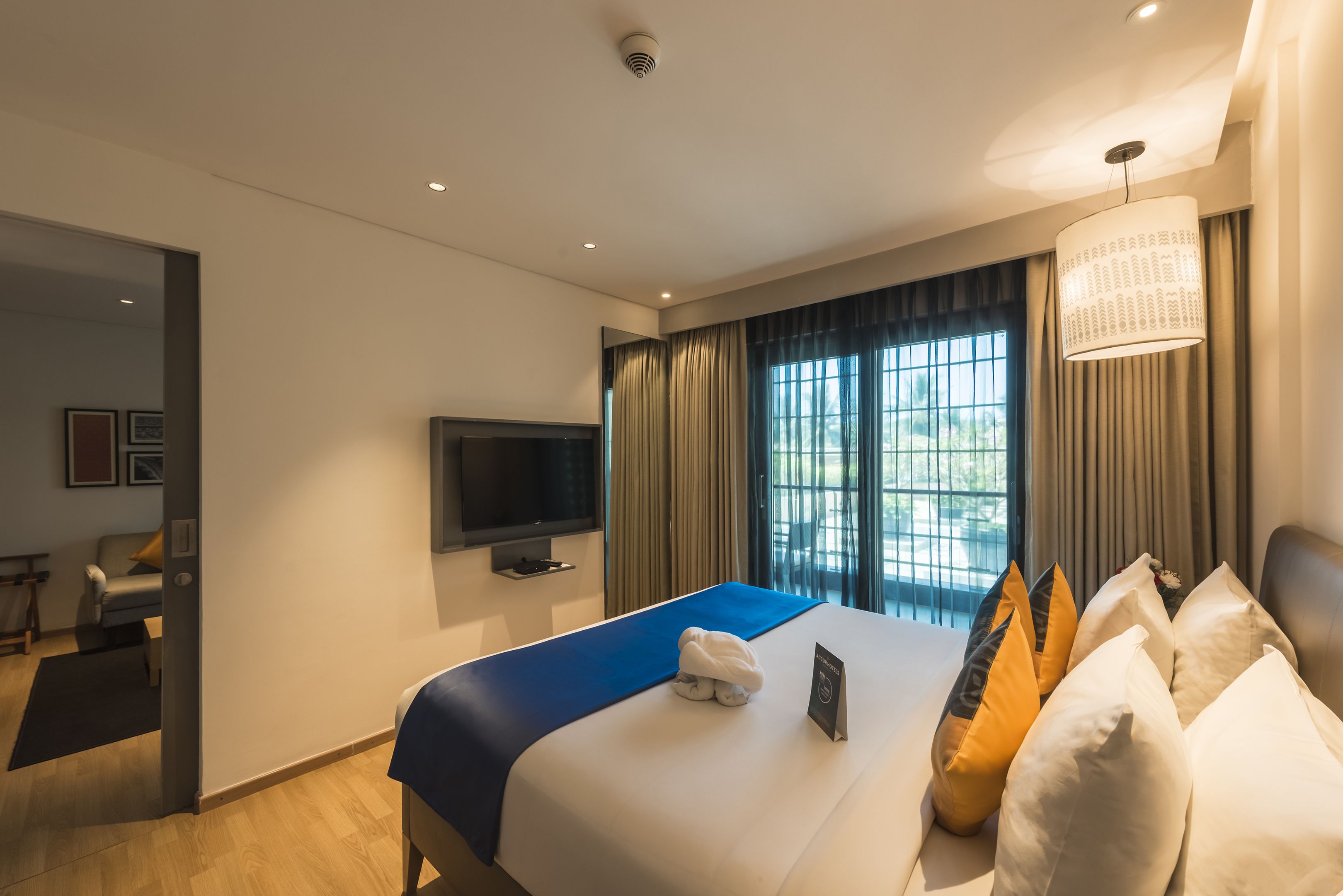 premier suite, balcony | living room | 40-inch led tv with satellite channels, tv