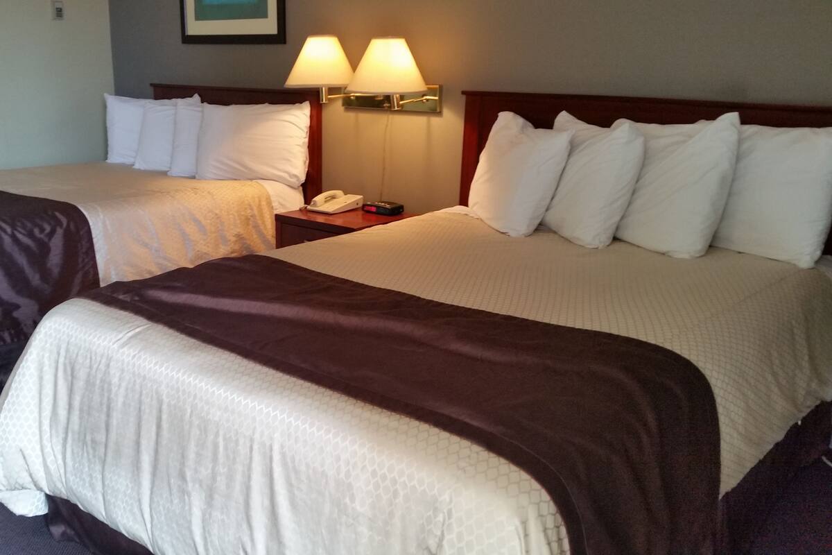 Room, 2 Queen Beds, Kitchenette | Premium bedding, desk, blackout curtains, iron/ironing board