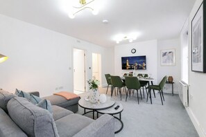 Large Two-Bedroom Apartment | Living area | Flat-screen TV