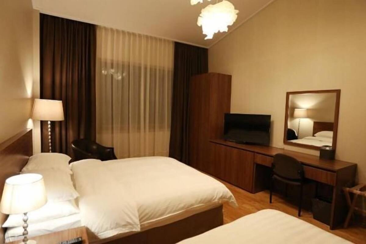 Premium bedding, down comforters, desk, blackout drapes