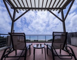 Habitación panorámica doble, vistas al mar | Balcón