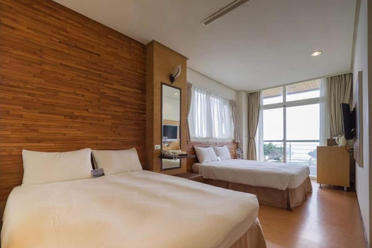 Chambre Quadruple Confort, 2 grands lits, non-fumeurs, vue océan | Couette en duvet d'oie, chambres insonorisées, Wi-Fi gratuit
