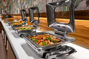 A buffet setup with various food items and utensils. - Le Room Hotel Taoyuan (Taoyuan City)