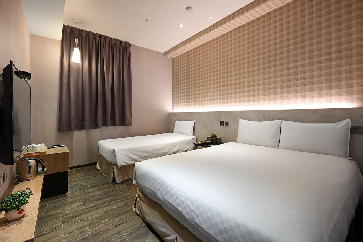 Chambre Triple Élite | Couette en duvet d'oie, rideaux occultants, Wi-Fi gratuit, draps fournis