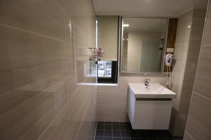Standard Quadruple Room | Bathroom | Shower, free toiletries, hair dryer, slippers
