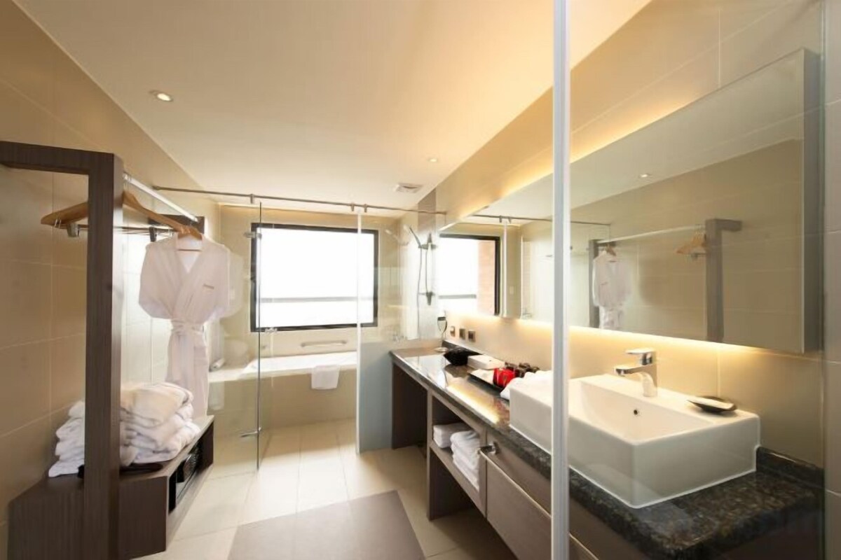 Bathroom | Hair dryer, slippers, towels