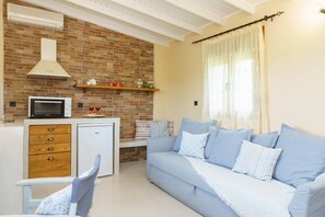 Family Room | Living area | LCD TV, tablet - Voulamandis House (Chios)