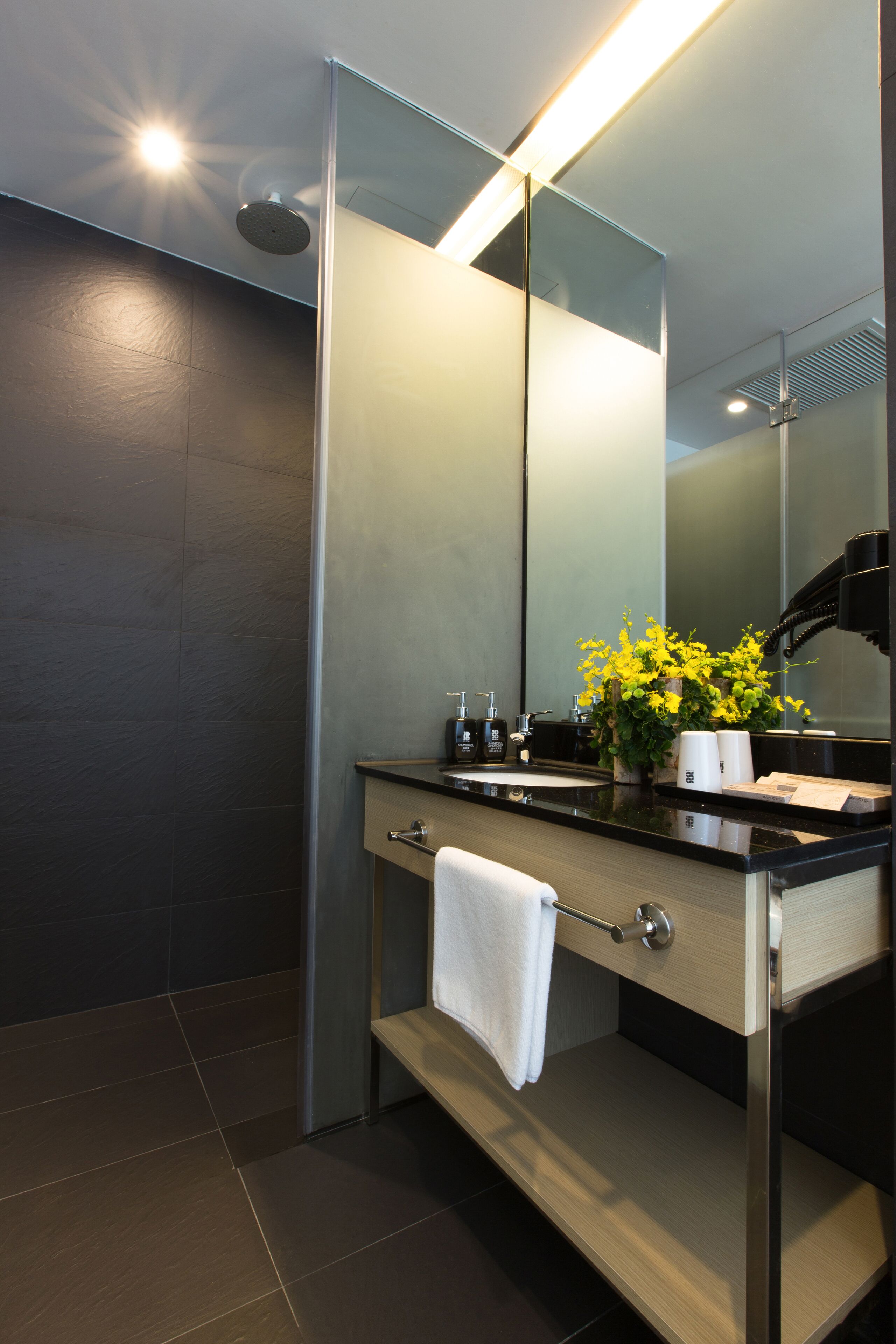 superior queen (no window) | bathroom | shower, free toiletries, hair dryer, bathrobes