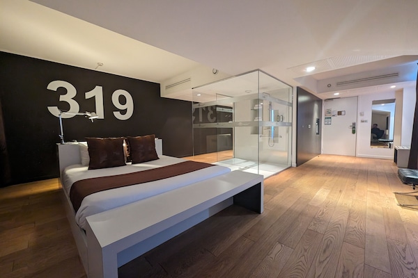 Suite Junior | Minibar, meja kerja, tirai kedap cahaya, dan kedap suara