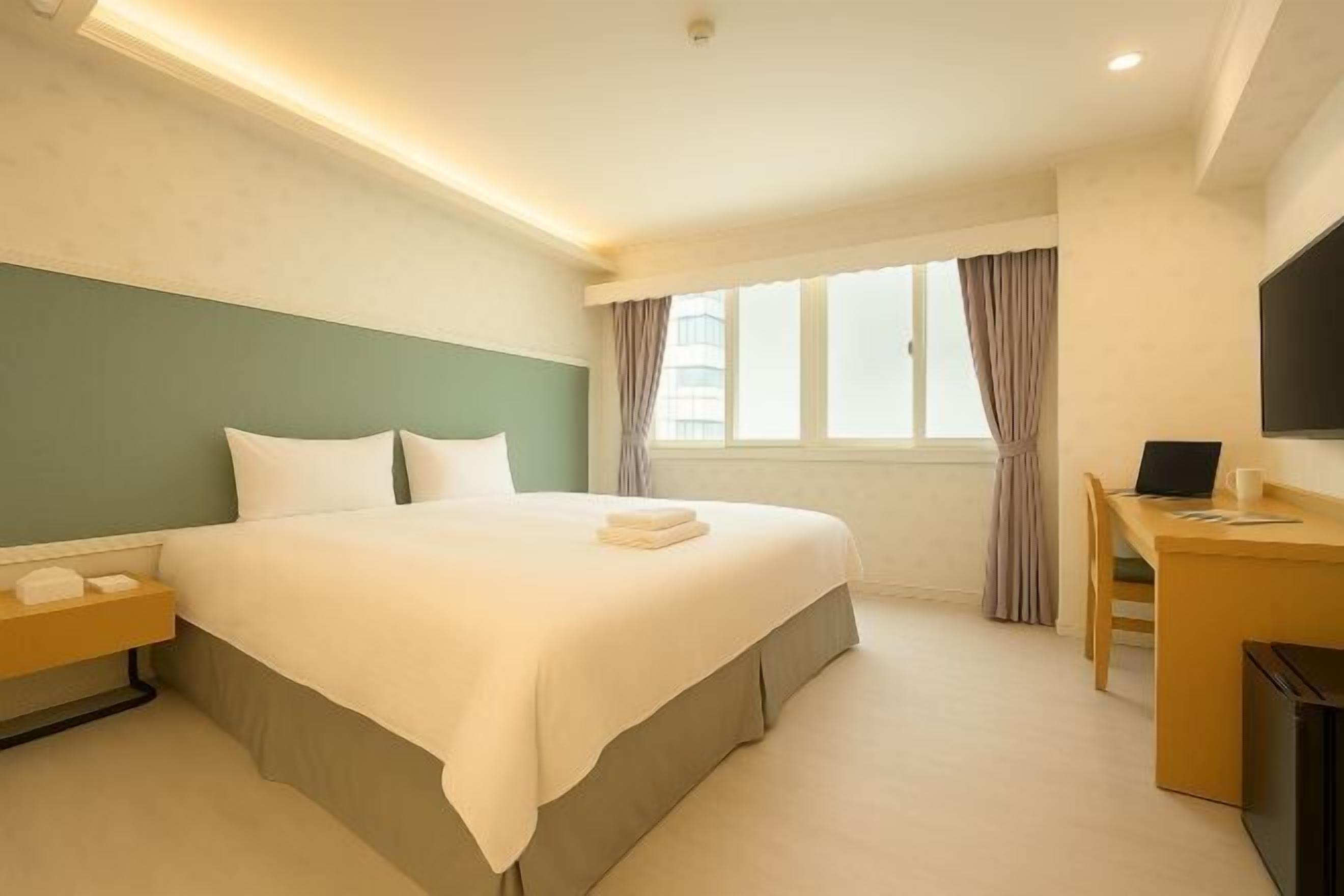 Premium bedding, down comforters, desk, soundproofing