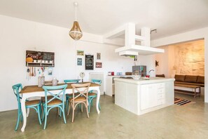 Fridge, stovetop, espresso maker, coffee/tea maker