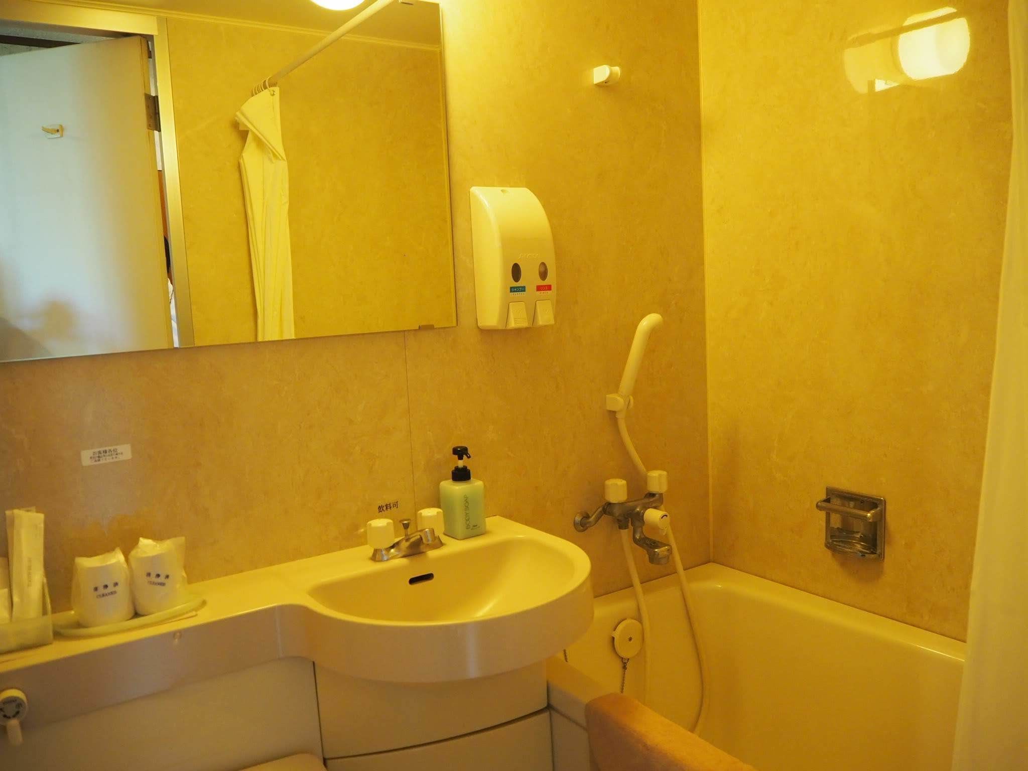 standard twin room a | bathroom | free toiletries, slippers, electronic bidet, towels