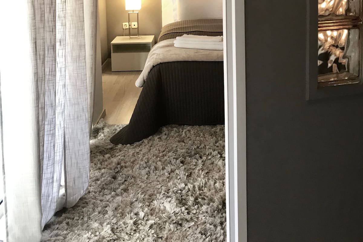 Apartamento superior, 1 quarto (B) | 1 quarto, roupas de cama de algodão egípcio, roupas de cama premium