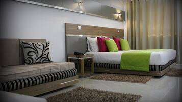 Premium bedding, in-room safe, blackout drapes, soundproofing