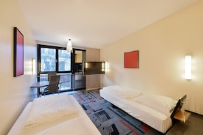Chambre Simple Standard | Literie de qualité supérieure, minibar, bureau, chambres insonorisées