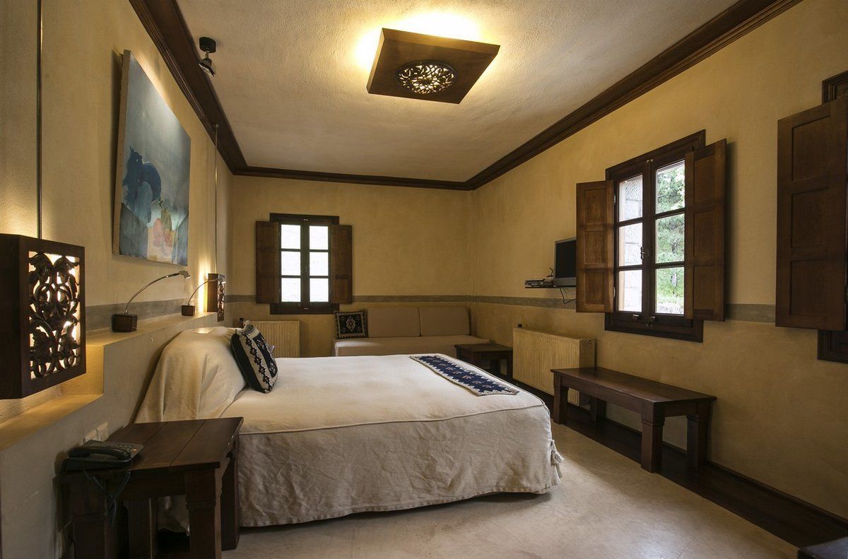 junior suite | minibar, in-room safe, desk, iron/ironing board