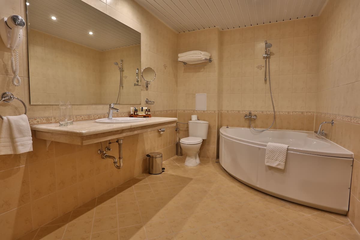 deluxe studio, sea view (free room safe) | bathroom | designer toiletries, hair dryer, bathrobes, slippers