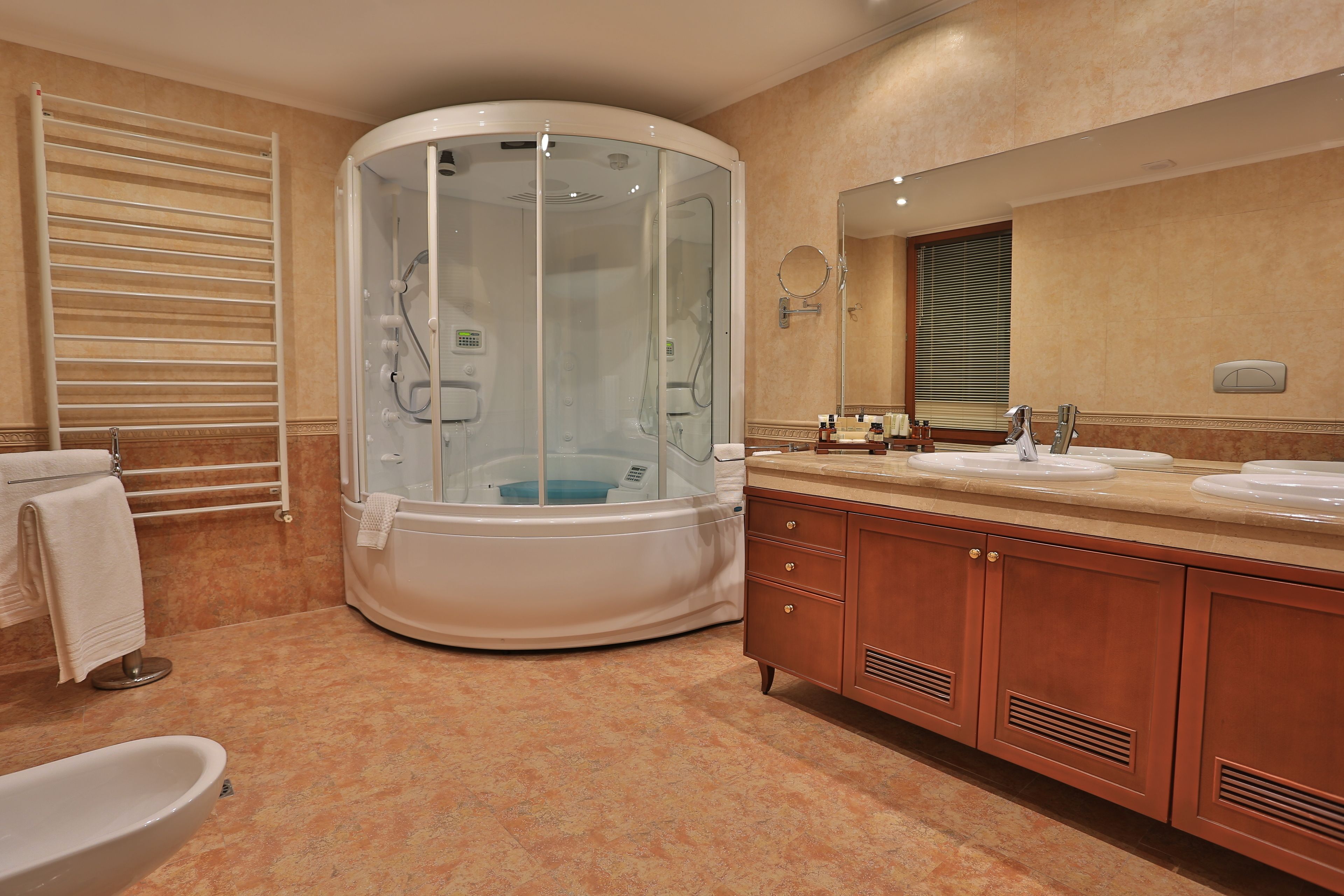 luxury suite, sea view (free room safe) | bathroom | designer toiletries, hair dryer, bathrobes, slippers