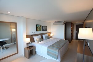 Deluxe Room, Sea Facing | Minibar, in-room safe, individually decorated, individually furnished