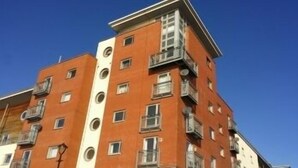 A multi-story building with balconies and windows. - Marine View (Dundee)